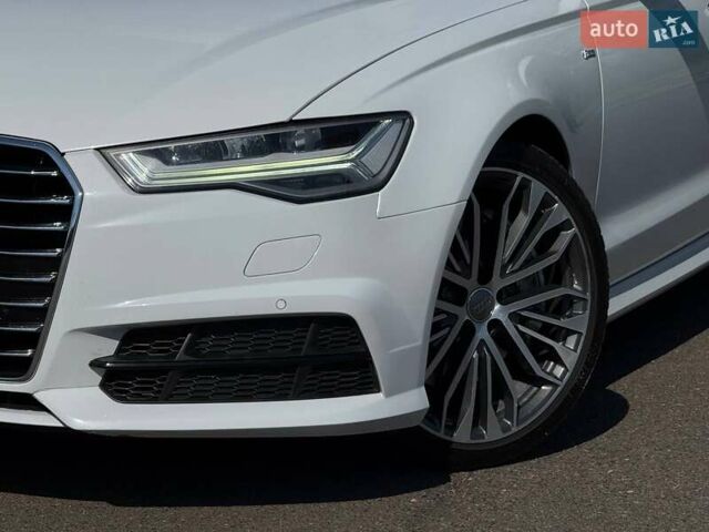 Белый Ауди А6, объемом двигателя 1.98 л и пробегом 138 тыс. км за 19500 $, фото 2 на Automoto.ua