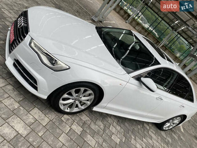 Белый Ауди А6, объемом двигателя 1.98 л и пробегом 73 тыс. км за 17300 $, фото 4 на Automoto.ua