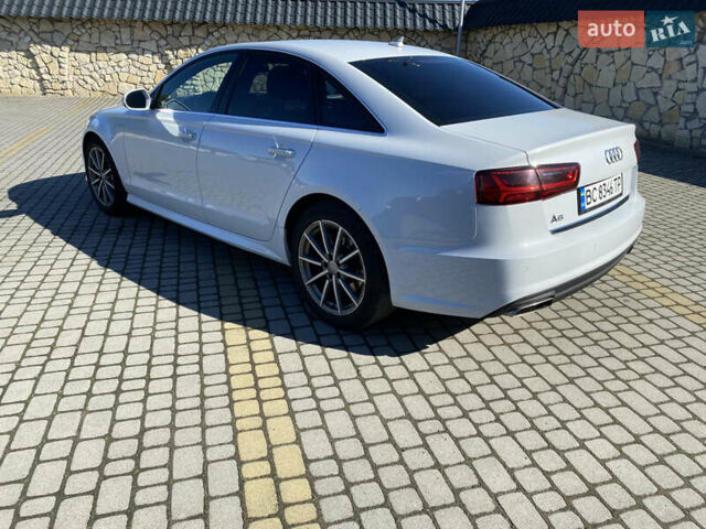 Белый Ауди А6, объемом двигателя 1.98 л и пробегом 150 тыс. км за 18500 $, фото 9 на Automoto.ua