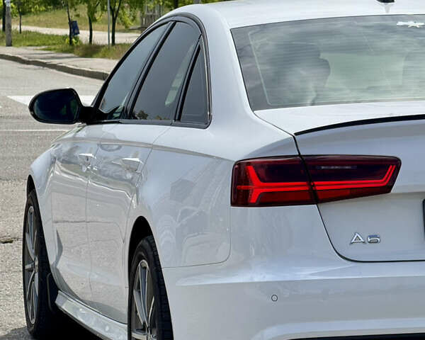 Белый Ауди А6, объемом двигателя 1.97 л и пробегом 190 тыс. км за 21500 $, фото 80 на Automoto.ua