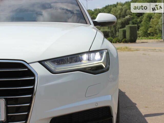 Білий Ауді А6, об'ємом двигуна 1.97 л та пробігом 90 тис. км за 27999 $, фото 22 на Automoto.ua
