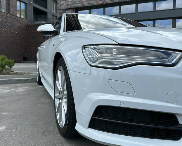 Белый Ауди А6, объемом двигателя 1.98 л и пробегом 71 тыс. км за 24000 $, фото 4 на Automoto.ua