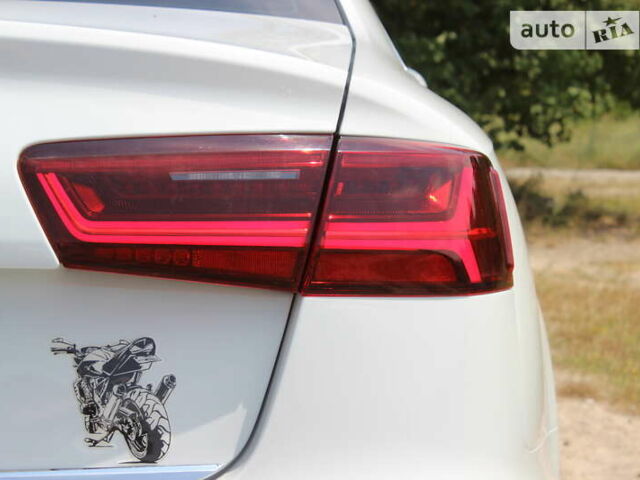 Білий Ауді А6, об'ємом двигуна 1.97 л та пробігом 90 тис. км за 27999 $, фото 28 на Automoto.ua
