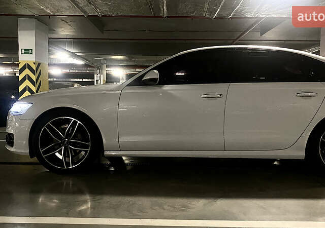 Білий Ауді А6, об'ємом двигуна 2 л та пробігом 79 тис. км за 29500 $, фото 1 на Automoto.ua