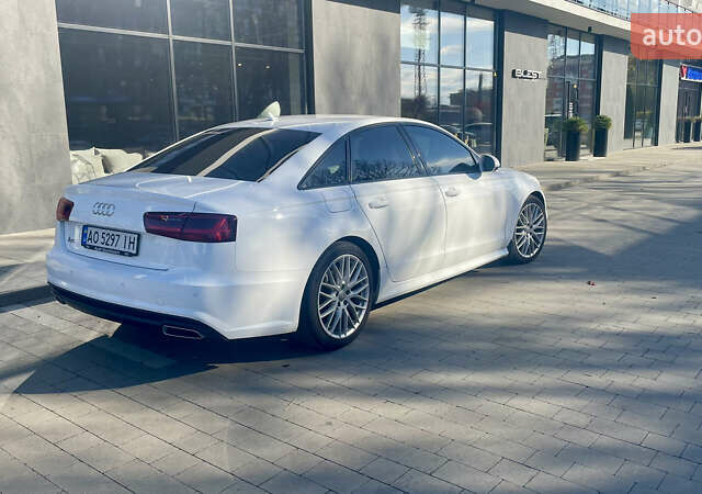 Білий Ауді А6, об'ємом двигуна 1.97 л та пробігом 215 тис. км за 26500 $, фото 2 на Automoto.ua