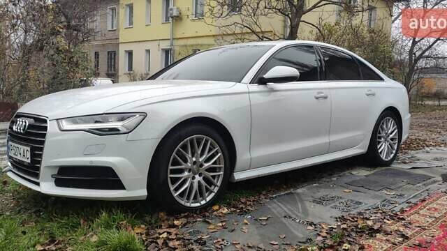 Белый Ауди А6, объемом двигателя 1.97 л и пробегом 118 тыс. км за 30000 $, фото 2 на Automoto.ua