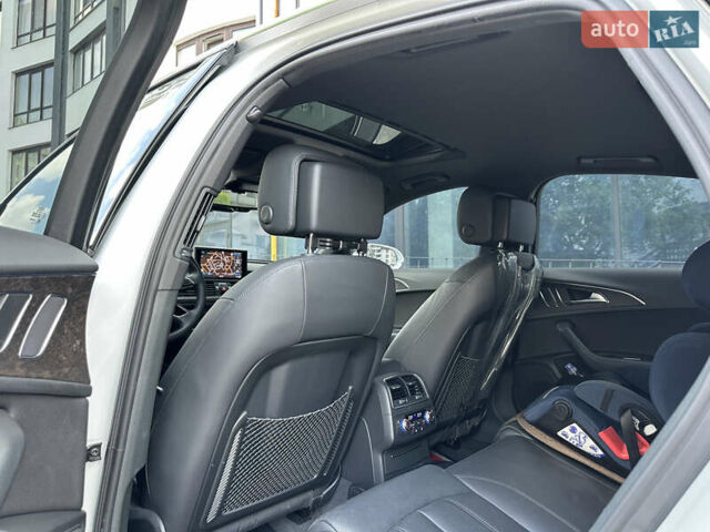 Белый Ауди А6, объемом двигателя 2 л и пробегом 77 тыс. км за 29600 $, фото 21 на Automoto.ua