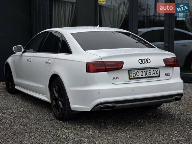 Білий Ауді А6, об'ємом двигуна 2 л та пробігом 78 тис. км за 25999 $, фото 2 на Automoto.ua
