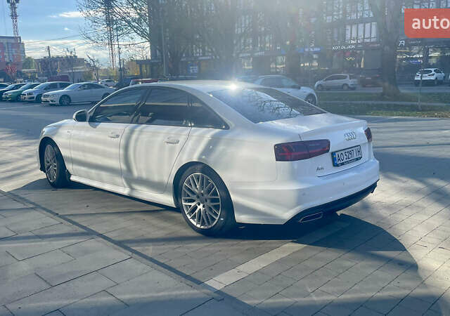 Білий Ауді А6, об'ємом двигуна 1.97 л та пробігом 215 тис. км за 26500 $, фото 4 на Automoto.ua