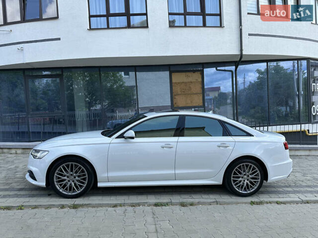 Белый Ауди А6, объемом двигателя 2 л и пробегом 77 тыс. км за 29600 $, фото 27 на Automoto.ua