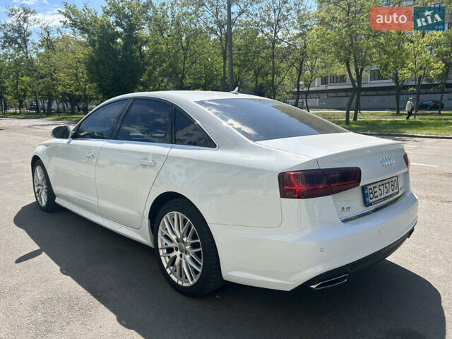 Белый Ауди А6, объемом двигателя 1.97 л и пробегом 75 тыс. км за 29500 $, фото 4 на Automoto.ua