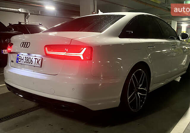 Білий Ауді А6, об'ємом двигуна 2 л та пробігом 79 тис. км за 29500 $, фото 10 на Automoto.ua