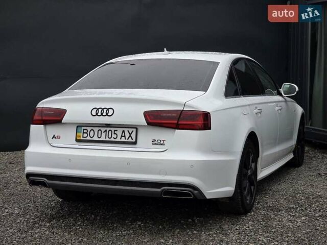Білий Ауді А6, об'ємом двигуна 2 л та пробігом 78 тис. км за 25999 $, фото 1 на Automoto.ua