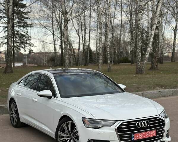 Білий Ауді А6, об'ємом двигуна 1.98 л та пробігом 52 тис. км за 32999 $, фото 1 на Automoto.ua