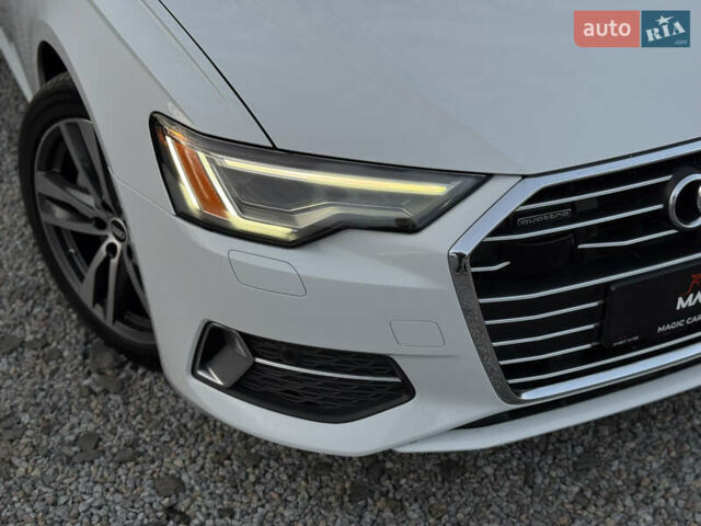 Білий Ауді А6, об'ємом двигуна 2 л та пробігом 56 тис. км за 30990 $, фото 2 на Automoto.ua