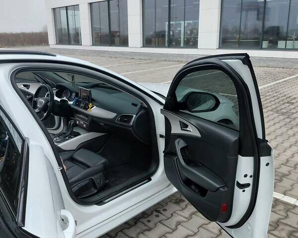 Білий Ауді А6, об'ємом двигуна 1.97 л та пробігом 265 тис. км за 24000 $, фото 17 на Automoto.ua