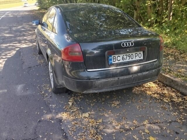 Черный Ауди А6, объемом двигателя 2.5 л и пробегом 400 тыс. км за 2800 $, фото 1 на Automoto.ua
