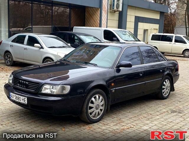 Черный Ауди А6, объемом двигателя 2.6 л и пробегом 350 тыс. км за 3500 $, фото 1 на Automoto.ua