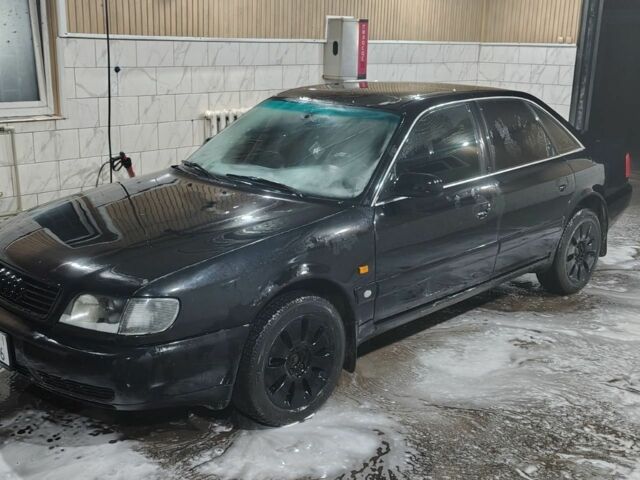 Черный Ауди А6, объемом двигателя 2.5 л и пробегом 450 тыс. км за 2000 $, фото 1 на Automoto.ua