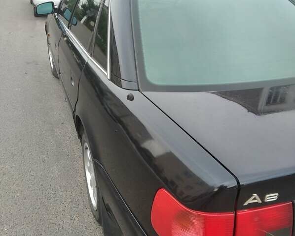 Черный Ауди А6, объемом двигателя 2.8 л и пробегом 416 тыс. км за 3500 $, фото 7 на Automoto.ua