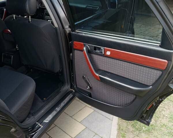 Черный Ауди А6, объемом двигателя 1.8 л и пробегом 450 тыс. км за 3800 $, фото 1 на Automoto.ua