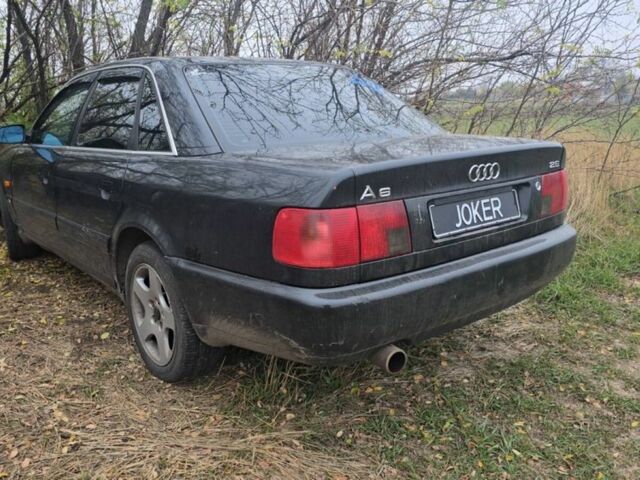 Черный Ауди А6, объемом двигателя 2.6 л и пробегом 250 тыс. км за 2381 $, фото 1 на Automoto.ua