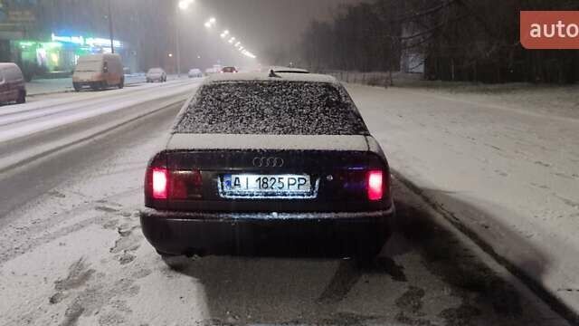 Черный Ауди А6, объемом двигателя 2.6 л и пробегом 370 тыс. км за 3000 $, фото 1 на Automoto.ua