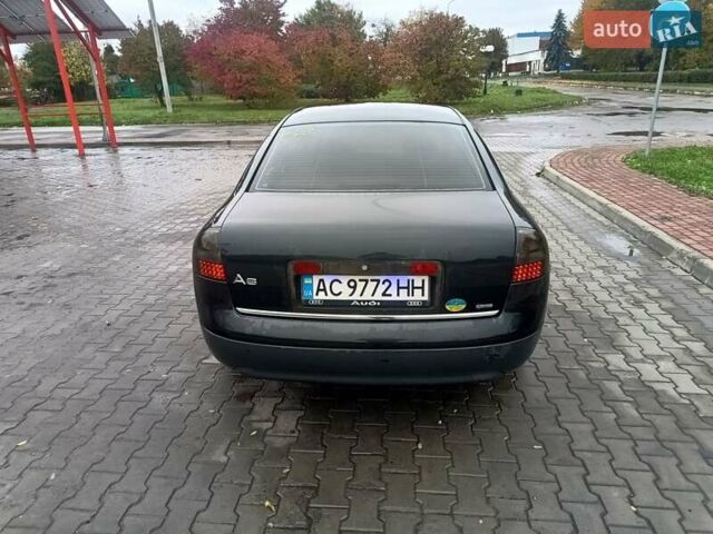 Черный Ауди А6, объемом двигателя 2.39 л и пробегом 331 тыс. км за 3700 $, фото 8 на Automoto.ua