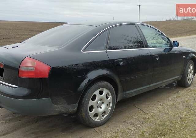 Черный Ауди А6, объемом двигателя 1.78 л и пробегом 284 тыс. км за 4150 $, фото 3 на Automoto.ua