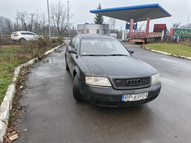 Чорний Ауді А6, об'ємом двигуна 2.5 л та пробігом 344 тис. км за 1550 $, фото 1 на Automoto.ua