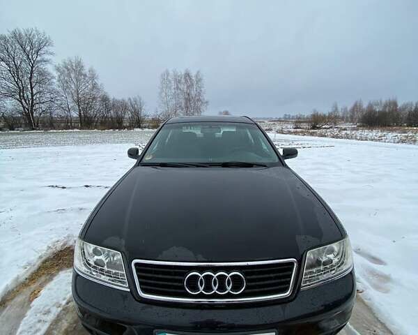 Черный Ауди А6, объемом двигателя 2.5 л и пробегом 350 тыс. км за 4000 $, фото 1 на Automoto.ua