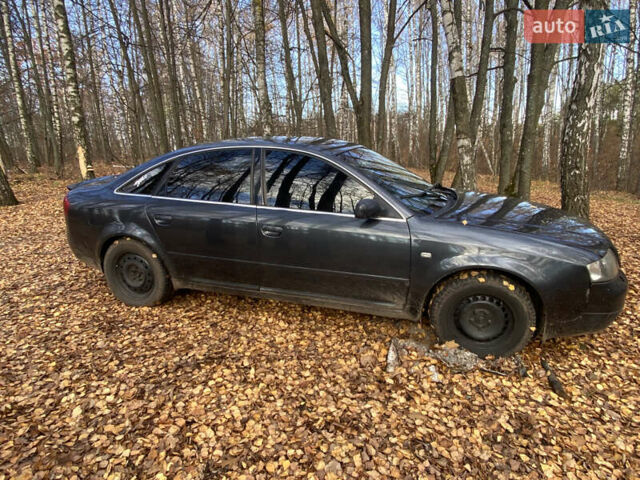 Черный Ауди А6, объемом двигателя 2.4 л и пробегом 390 тыс. км за 3600 $, фото 1 на Automoto.ua