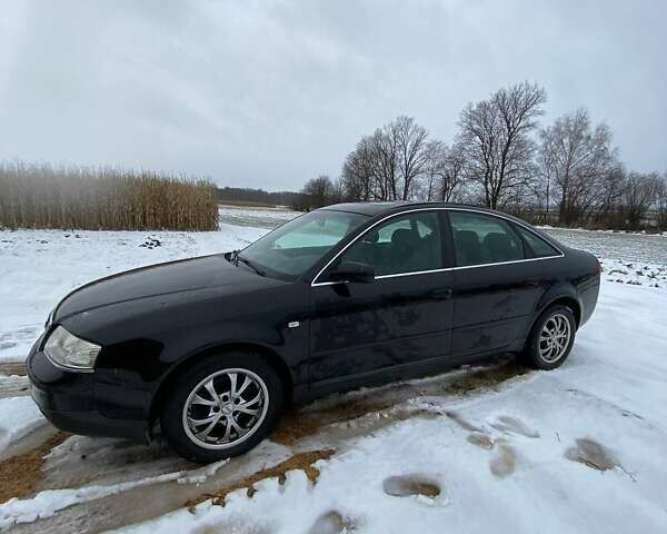 Черный Ауди А6, объемом двигателя 2.5 л и пробегом 350 тыс. км за 4000 $, фото 2 на Automoto.ua