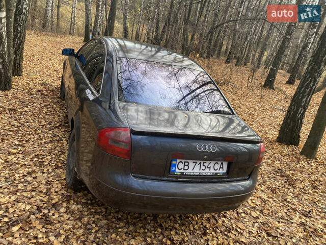 Черный Ауди А6, объемом двигателя 2.4 л и пробегом 390 тыс. км за 3600 $, фото 3 на Automoto.ua