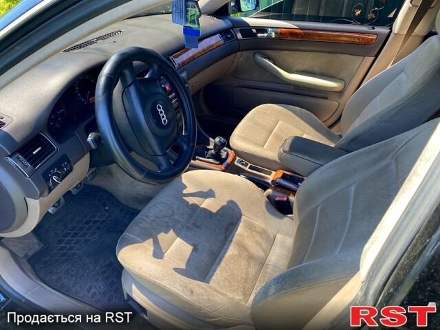 Черный Ауди А6, объемом двигателя 1.8 л и пробегом 340 тыс. км за 2600 $, фото 5 на Automoto.ua