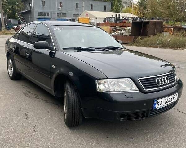 Черный Ауди А6, объемом двигателя 2.8 л и пробегом 472 тыс. км за 3750 $, фото 1 на Automoto.ua