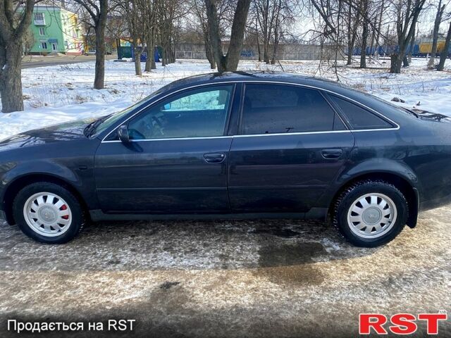 Черный Ауди А6, объемом двигателя 2.8 л и пробегом 382 тыс. км за 4400 $, фото 1 на Automoto.ua