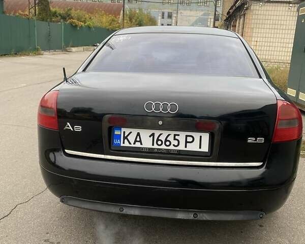 Черный Ауди А6, объемом двигателя 2.8 л и пробегом 472 тыс. км за 3750 $, фото 4 на Automoto.ua