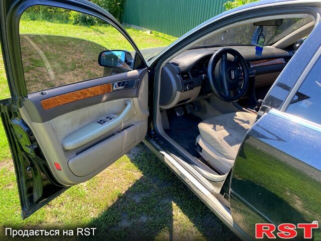 Черный Ауди А6, объемом двигателя 1.8 л и пробегом 340 тыс. км за 2600 $, фото 4 на Automoto.ua