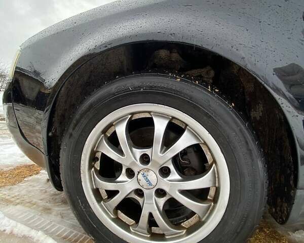 Черный Ауди А6, объемом двигателя 2.5 л и пробегом 350 тыс. км за 4000 $, фото 6 на Automoto.ua