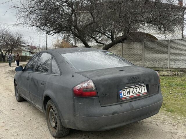 Черный Ауди А6, объемом двигателя 2.5 л и пробегом 300 тыс. км за 1450 $, фото 3 на Automoto.ua