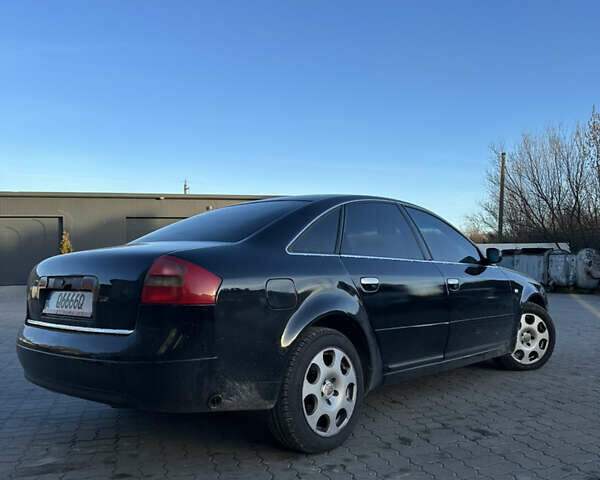 Черный Ауди А6, объемом двигателя 1.78 л и пробегом 327 тыс. км за 3800 $, фото 2 на Automoto.ua