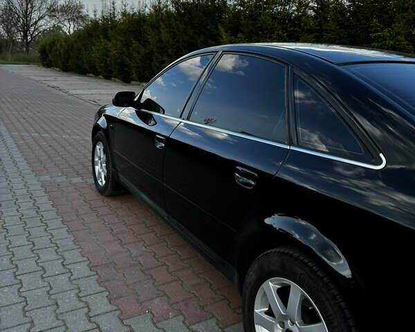 Черный Ауди А6, объемом двигателя 2.4 л и пробегом 531 тыс. км за 4300 $, фото 3 на Automoto.ua