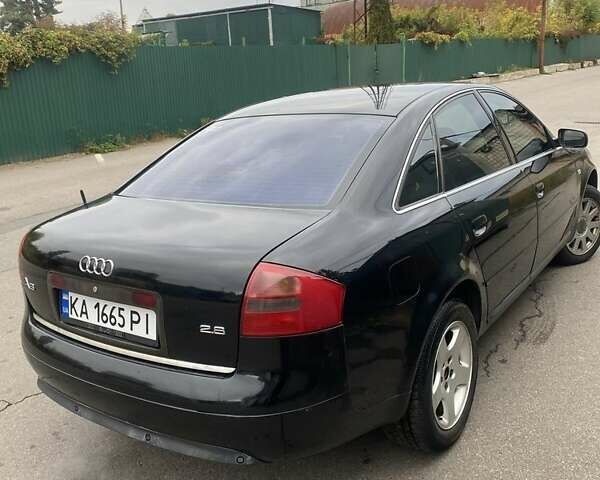 Черный Ауди А6, объемом двигателя 2.8 л и пробегом 472 тыс. км за 3750 $, фото 2 на Automoto.ua
