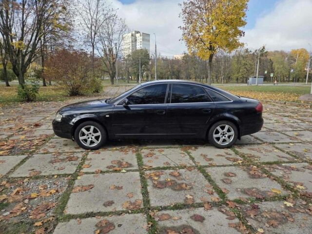 Чорний Ауді А6, об'ємом двигуна 2.4 л та пробігом 276 тис. км за 3950 $, фото 1 на Automoto.ua