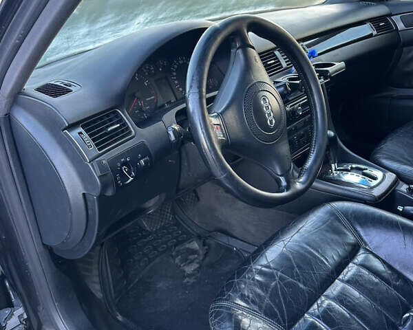 Черный Ауди А6, объемом двигателя 1.78 л и пробегом 327 тыс. км за 3800 $, фото 7 на Automoto.ua