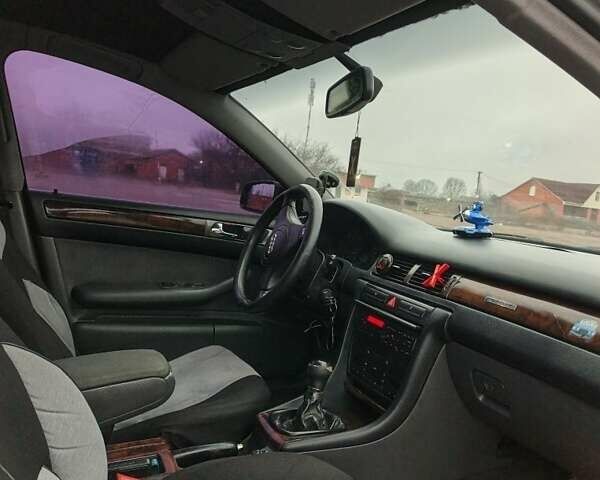 Черный Ауди А6, объемом двигателя 1.9 л и пробегом 256 тыс. км за 3800 $, фото 5 на Automoto.ua