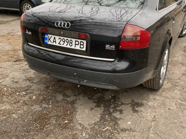 Черный Ауди А6, объемом двигателя 2.4 л и пробегом 390 тыс. км за 4000 $, фото 4 на Automoto.ua