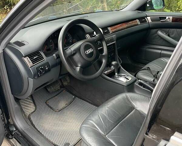 Черный Ауди А6, объемом двигателя 2.4 л и пробегом 337 тыс. км за 3700 $, фото 10 на Automoto.ua