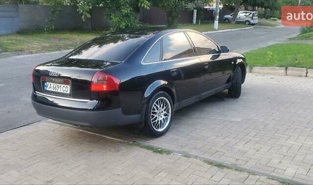 Черный Ауди А6, объемом двигателя 1.78 л и пробегом 370 тыс. км за 5300 $, фото 4 на Automoto.ua